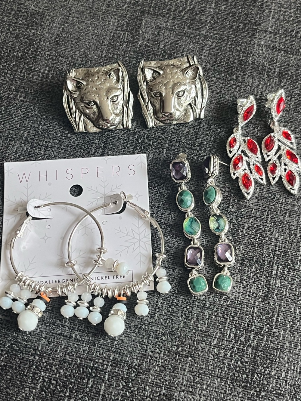 Four pairs of costume earrings